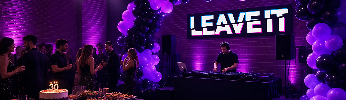 The main room set for a private party with a banner, a buffet and the lights on low.